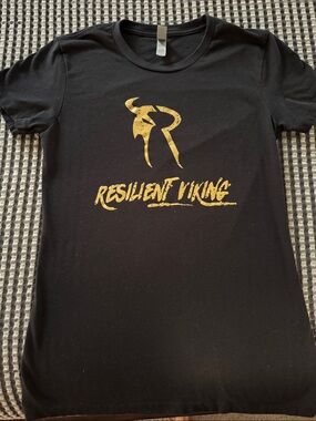 Next Level Apparel Black Short Sleeve Tee with Gold "Resilient Viking" Graphic